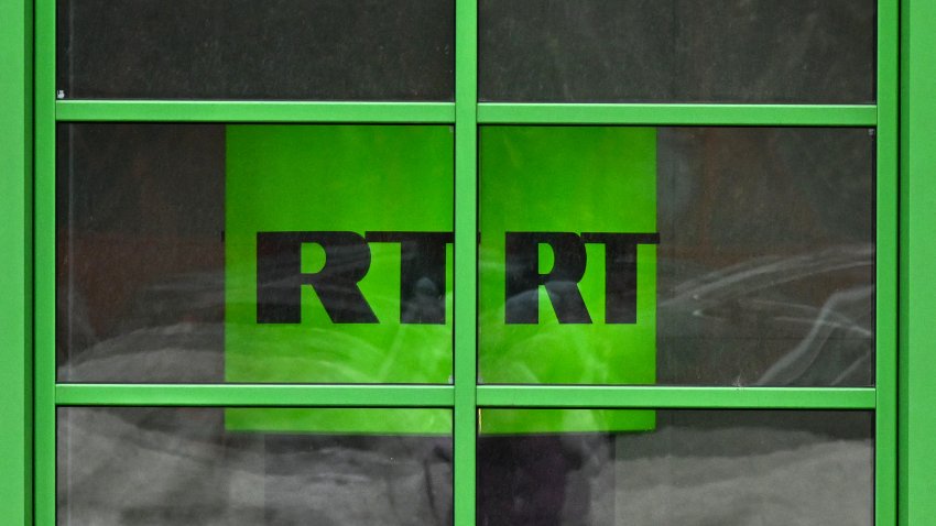 This photograph taken in Moscow on January 22, 2023 shows the logo of RT (Russia Today) TV channel displayed at the company headquarters. Moscow will retaliate against French media in Russia after the bank accounts of RT France, the French arm of its state broadcaster, were frozen, Russian news agencies reported on January 21, 2023. (Photo by Kirill KUDRYAVTSEV / AFP) (Photo by KIRILL KUDRYAVTSEV/AFP via Getty Images)