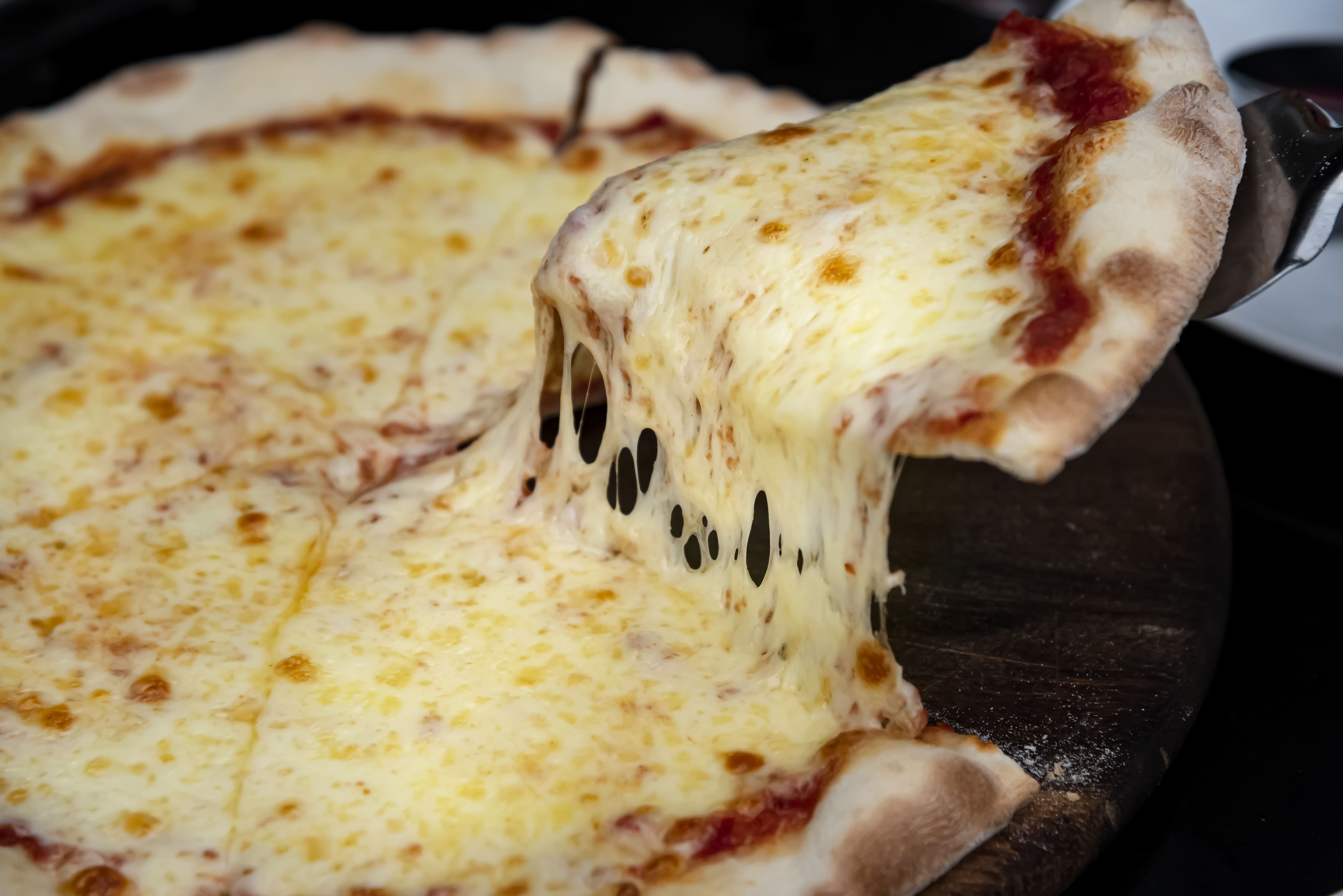 National Cheese Pizza Day 2024 Deals for a slice of savings NBC 7