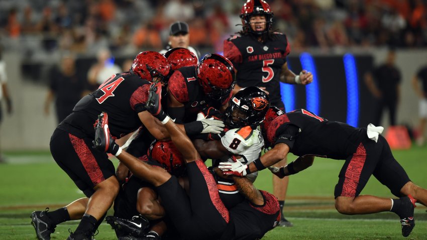 SAN DIEGO, CA – SEPTEMBER 07: Oregon State running back Jam Griffin (8) is tackled by the San Diego State defense during a college football game between the Oregon State Beavers and the San Diego State Aztecs on September 07, 2024, at Snapdragon Stadium in San Diego, CA. (Photo by Chris Williams/Icon Sportswire via Getty Images)