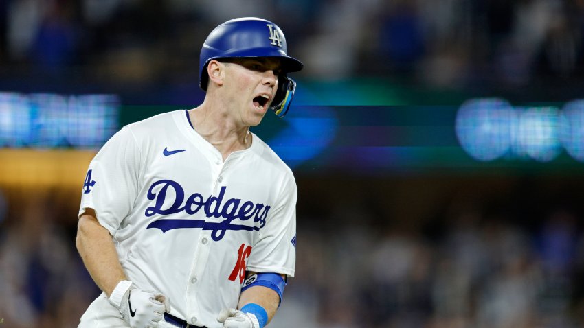 LOS ANGELES, CALIFORNIA – SEPTEMBER 26: Will Smith #16 of the Los Angeles Dodgers hits two run home against pitcher Joe Musgrove #44 of the San Diego Padres during the seventh inning at Dodger Stadium on September 26, 2024 in Los Angeles, California. (Photo by Kevork Djansezian/Getty Images)