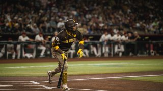 PHOENIX, ARIZONA – SEPTEMBER 27: Luis Arraez #4 of the San Diego Padres swings and hits the ball in the first inning against the Arizona Diamondbacks at Chase Field on September 27, 2024 in Phoenix, Arizona. (Photo by Matt Thomas/San Diego Padres/Getty Images)