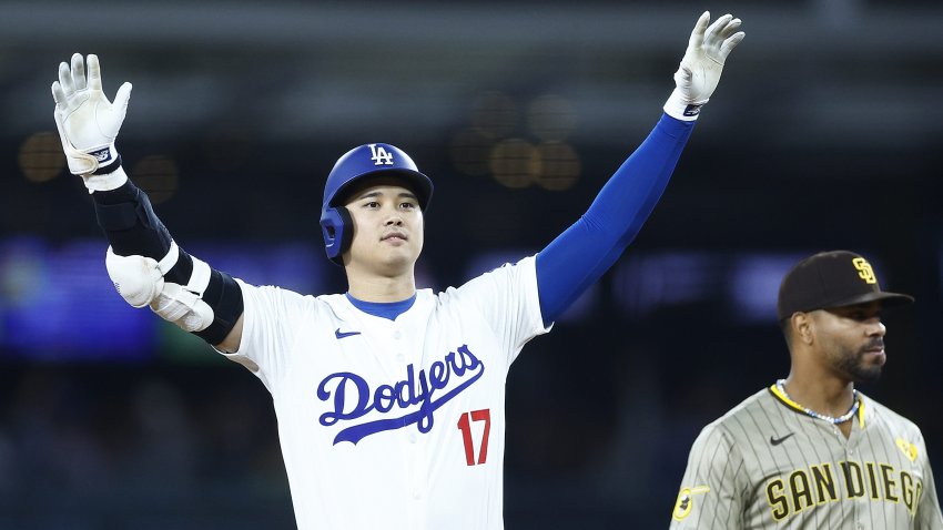 LOS ANGELES, CALIFORNIA – SEPTEMBER 25:  Shohei Ohtani #17 of the Los Angeles Dodgers reacts after a rbi double against the San Diego Padres in the fourth inning at Dodger Stadium on September 25, 2024 in Los Angeles, California. (Photo by Ronald Martinez/Getty Images)