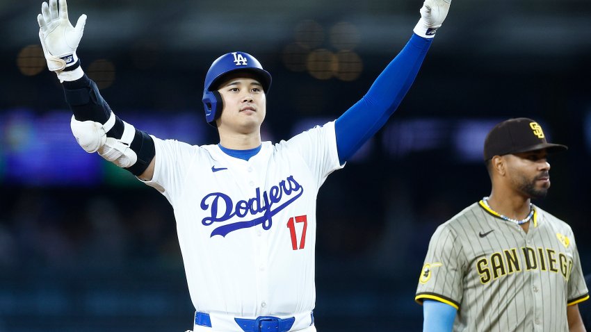 LOS ANGELES, CALIFORNIA – SEPTEMBER 25:  Shohei Ohtani #17 of the Los Angeles Dodgers reacts after a rbi double against the San Diego Padres in the fourth inning at Dodger Stadium on September 25, 2024 in Los Angeles, California. (Photo by Ronald Martinez/Getty Images)