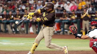 PHOENIX, ARIZONA – SEPTEMBER 29: Luis Arraez #4 of the San Diego Padres hits a double during the sixth inning against the Arizona Diamondbacks at Chase Field on September 29, 2024 in Phoenix, Arizona. This was Arraez’s 200th hit of the season. (Photo by Chris Coduto/Getty Images)