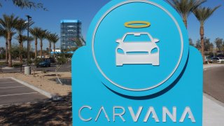 A Carvana sign and signature vending machine in Tempe, Arizona.