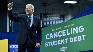 US President Joe Biden gestures after speaking about student loan debt relief at Madison Area Technical College in Madison, Wisconsin, April 8, 2024.