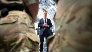 Labour leader Sir Keir Starmer speaks to military personnel during a visit to a RAF base in Oxfordshire to meet troops and thank them for their service ahead of Armed Forces Day on Saturday 24 June.