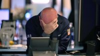 Traders work on the floor of the New York Stock Exchange during afternoon trading on October 03, 2024 in New York City. 