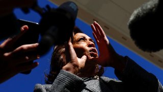 Democratic presidential nominee U.S. Vice President Kamala Harris speaks to the media before boarding Air Force Two to depart for Michigan, at Joint Base Andrews, Maryland, U.S. October 28, 2024.
