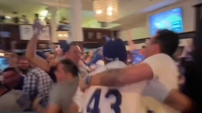 Dodger fans celebrate first World Series game against the Yankees