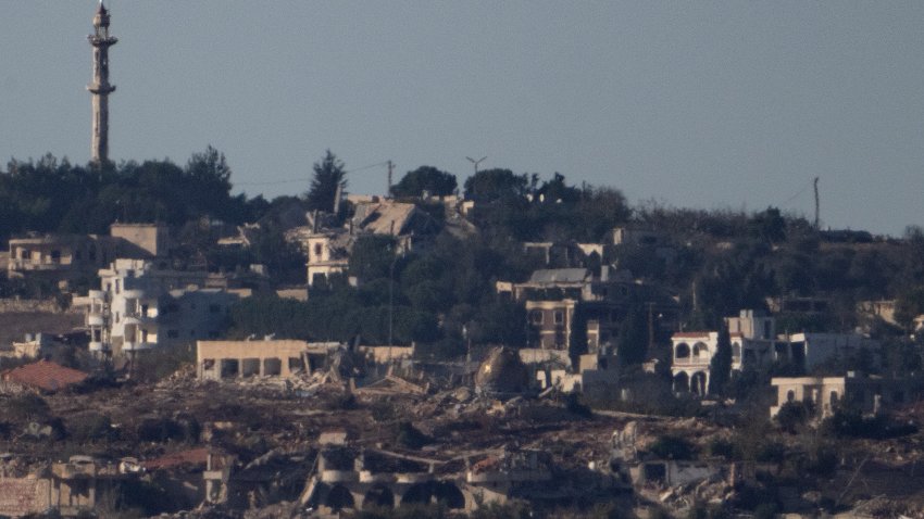 Destroyed buildings stand in an area in southern Lebanon as seen from northern Israel, Tuesday, Oct. 8, 2024.