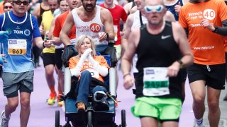 Actor Colin Farrell running with close friend Emma Fogarty who is the longest living survivor of Epidermolysis Bullsosa, during the Irish Life Dublin Marathon 2024, Dublin, Ireland, Sunday, Oct. 27, 2024.