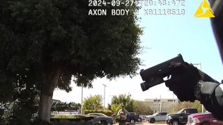 A screenshot from the video released by the San Diego County Sheriff's Department showing the tow truck window that was broken after shots were fired.