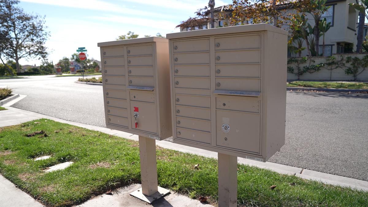 Neighbors say thieves broke a cluster mailbox in Carlsbad's Bressi Ranch neighborhood while stealing mail, which included mail-in-ballots. 