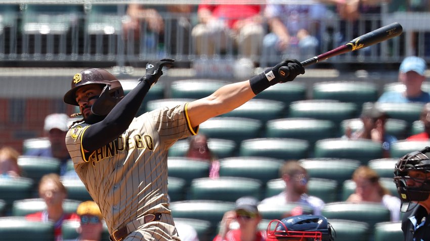 ATLANTA, GEORGIA – MAY 20:  Fernando Tatis Jr. #23 of the San Diego Padres hits a single in the eighth inning against the Atlanta Braves at Truist Park on May 20, 2024 in Atlanta, Georgia. (Photo by Kevin C. Cox/Getty Images)