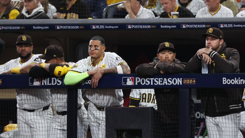 SAN DIEGO, CALIFORNIA – OCTOBER 09: The San Diego Padres bench watches game action during the third inning in game four of the National League Division Series against the Los Angeles Dodgers at Petco Park on Wednesday, Oct. 9, 2024 in San Diego. (Robert Gauthier / Los Angeles Times via Getty Images)