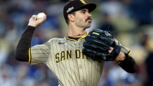 LOS ANGELES, CALIFORNIA - OCTOBER 05: Dylan Cease #84 of the San Diego Padres throws a pitch during the second inning against the Los Angeles Dodgers in Game One of the Division Series at Dodger Stadium on October 05, 2024 in Los Angeles, California.  (Photo by Harry How/Getty Images)