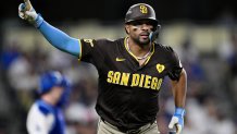 LOS ANGELES, CALIFORNIA - OCTOBER 06: Xander Bogaerts #2 of the San Diego Padres celebrates after hitting a home run in the eighth inning against the Los Angeles Dodgers during Game Two of the Division Series at Dodger Stadium on October 06, 2024 in Los Angeles, California. (Photo by Orlando Ramirez/Getty Images)