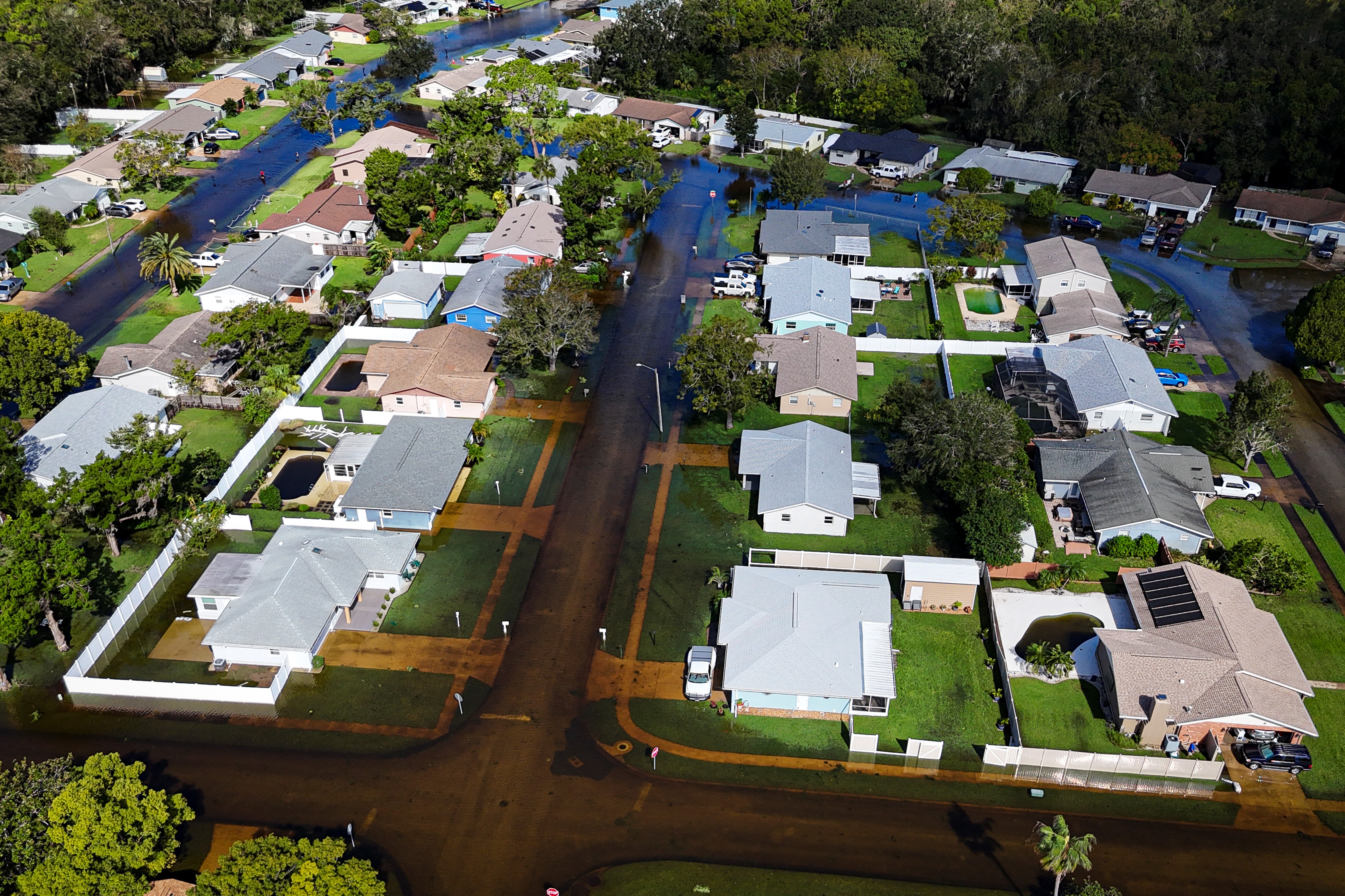 An aerial view shows a flooded neighborhood in the aftermath of Hurricane Milton in South Daytona, Fla, on Oct. 11, 2024.