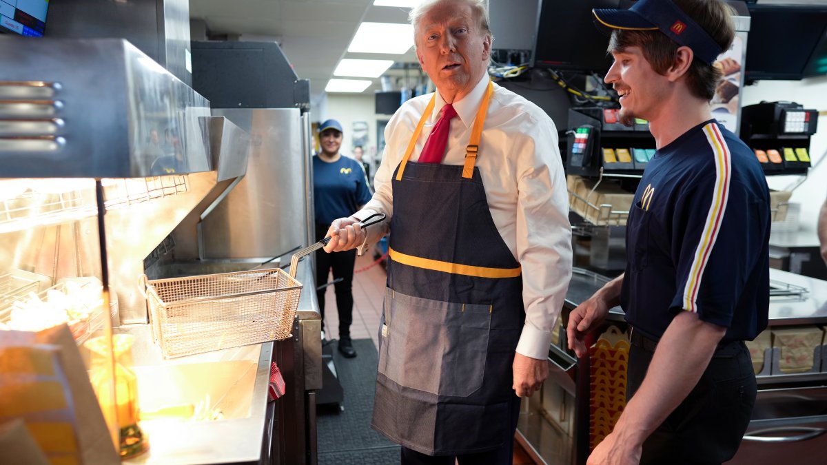 Trump attempts to troll Harris by serving french fries at a