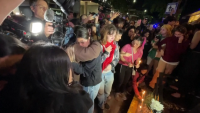 Fans gather outside the CasaSur Palermo Hotel