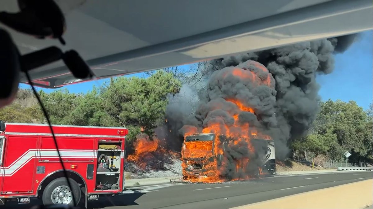 RV fire spreads to brush in Poway, causes evacuations, road closure ...