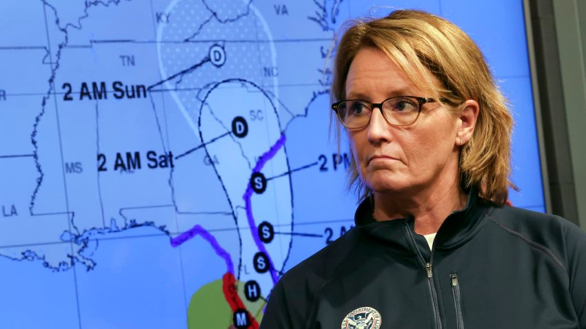 Federal Emergency Management Agency (FEMA) Administrator Deanne Criswell stands next to a track map of Hurricane Ian, during a press conference at FEMA Headquarters on September 28, 2022 in Washington, DC.