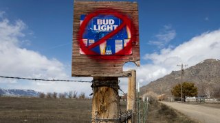 A sign disparaging Bud Light beer is seen along a country road on April 21, 2023 in Arco, Idaho. Anheuser-Busch, the brewer of Bud Light has faced backlash after the company sponsored two Instagram posts from a transgender woman.