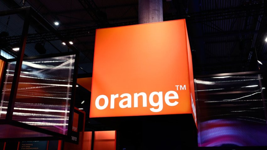 The logo of telecoms giant Orange displayed at Mobile World Congress 2024 in Barcelona, Spain.