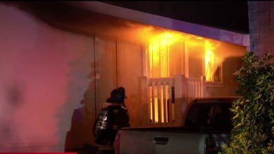 2 people rescued from burning mobile home in Vista