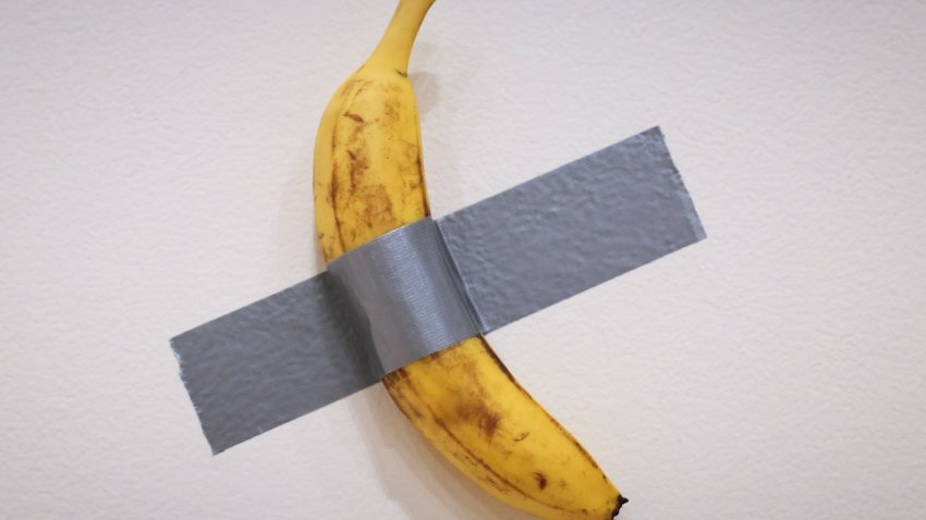 Banana duct-taped to a wall