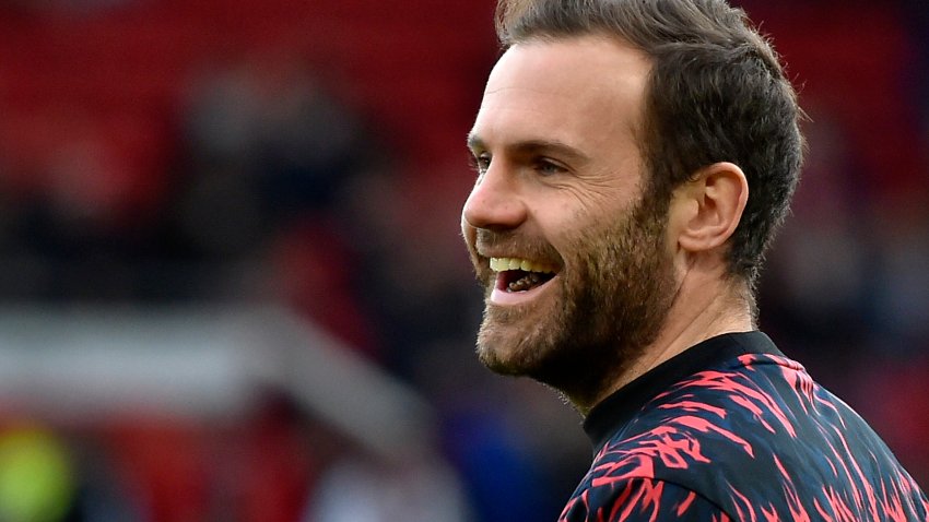 FILE - Manchester United's Juan Mata smiles during the warm up before the English Premier League soccer match between Manchester United and Tottenham Hotspur, at the Old Trafford stadium in Manchester, England, March 12, 2022. (AP Photo/Rui Vieira, File)