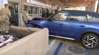 The blue Mini Cooper crashed into Costco on Friday morning in Mission Valley