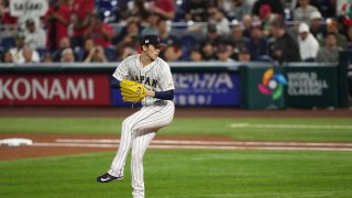 MIAMI, FL – MARCH 20: Roki Sasaki #14 of Japan delivers a pitch in the first inning against Mexico at loanDepot park on March 20, 2023 in Miami, Florida. (Photo by Jasen Vinlove/Miami Marlins/Getty Images)