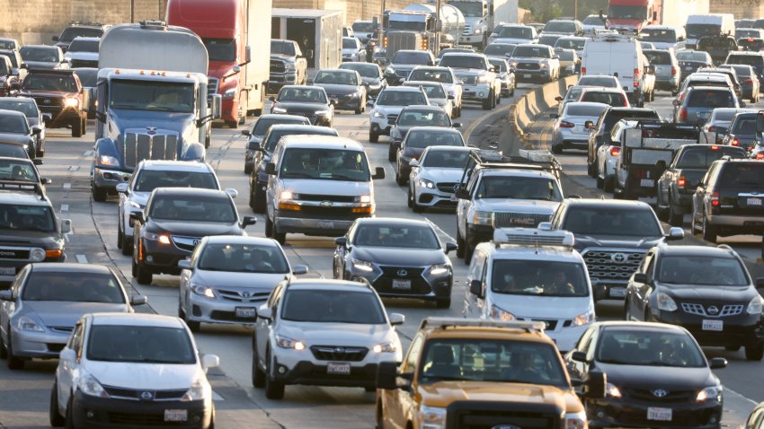 LOS ANGELES, CALIFORNIA – NOVEMBER 23: Heavy afternoon traffic moves along the I-5 on November 23, 2022 in Los Angeles, California. The American Automobile Association (AAA) predicts nearly 55 million Americans will travel 50 miles or more for the Thanksgiving holiday weekend, 98 percent of pre-pandemic volumes. AAA also projects that nearly 49 million are expected to travel by vehicle this week, while around 4.5 million will fly to their Thanksgiving destinations. (Photo by Mario Tama/Getty Images)