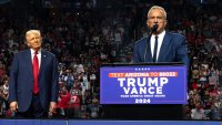 Former presidential candidate Robert F. Kennedy Jr. (R) speaks as Republican presidential nominee, former U.S. President Donald Trump listens during a campaign rally at Desert Diamond Arena on August 23, 2024 in Glendale, Arizona.