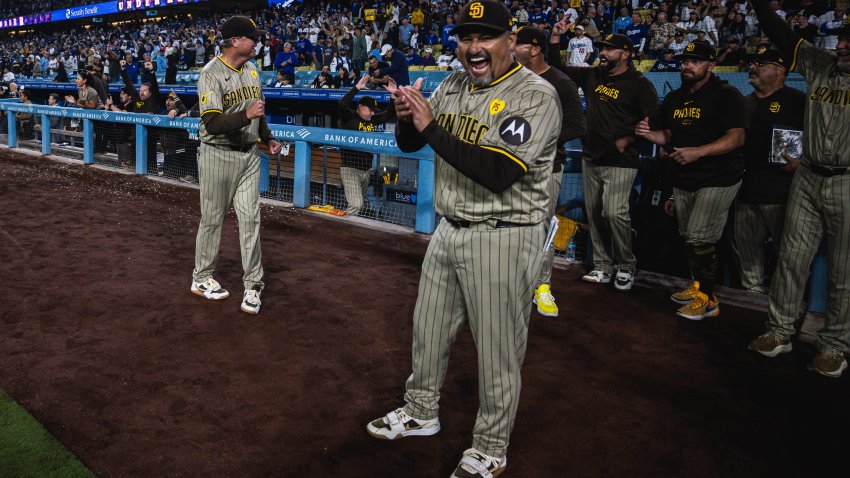 LOS ANGELES, CALIFORNIA – SEPTEMBER 24: Pitching Coach Ruben Niebla #57 of San Diego Padres celebrates after defeating the Los Angeles Dodgers and securing a Post-Season bid at Dodger Stadium on September 24, 2024 in Los Angeles, California. (Photo by Matt Thomas/San Diego Padres/Getty Images)