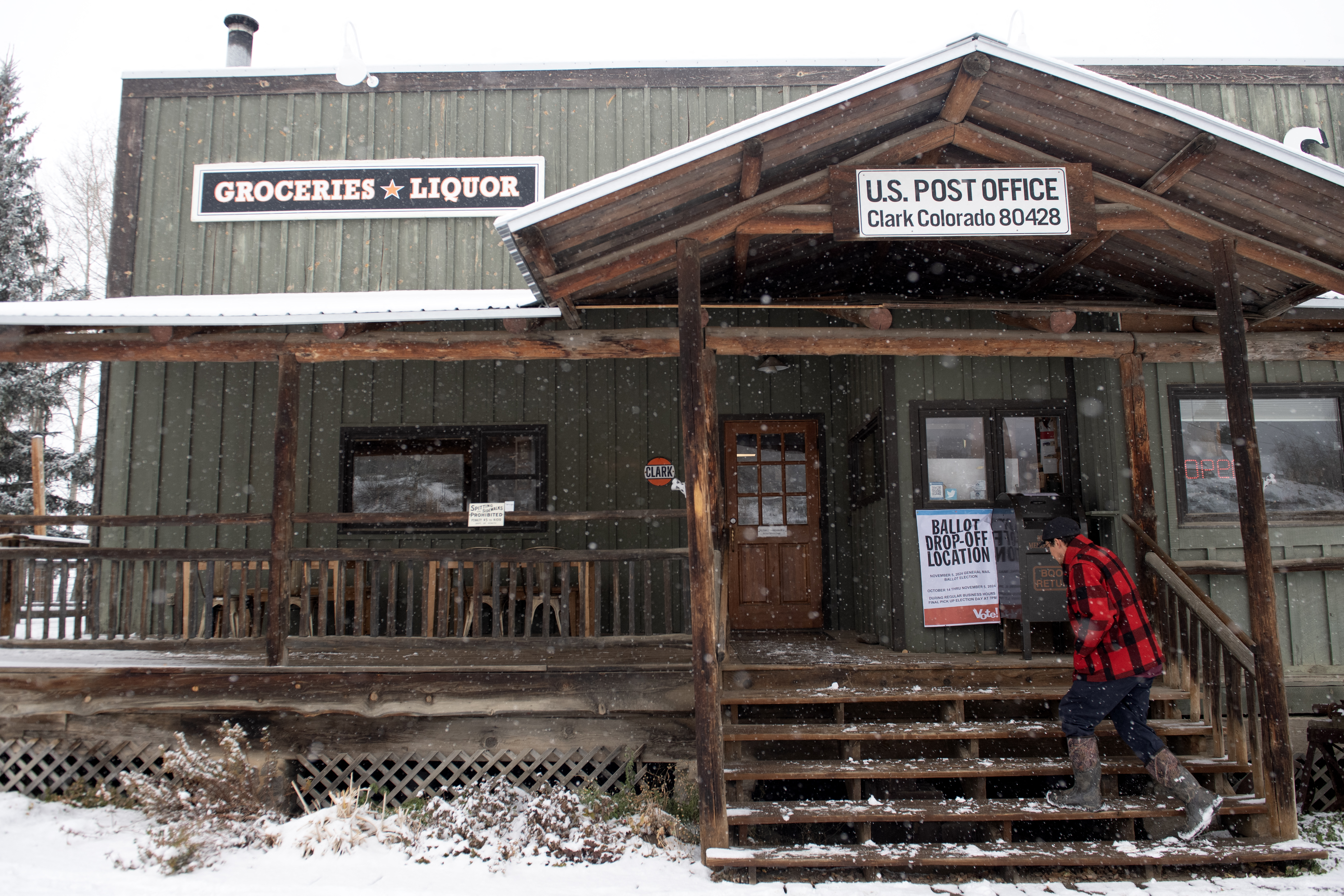 A customer enters general store and post office, which serves as a ballot drop-off location in Routt County, in Clark, Colorado on Election Day on November 5, 2024.