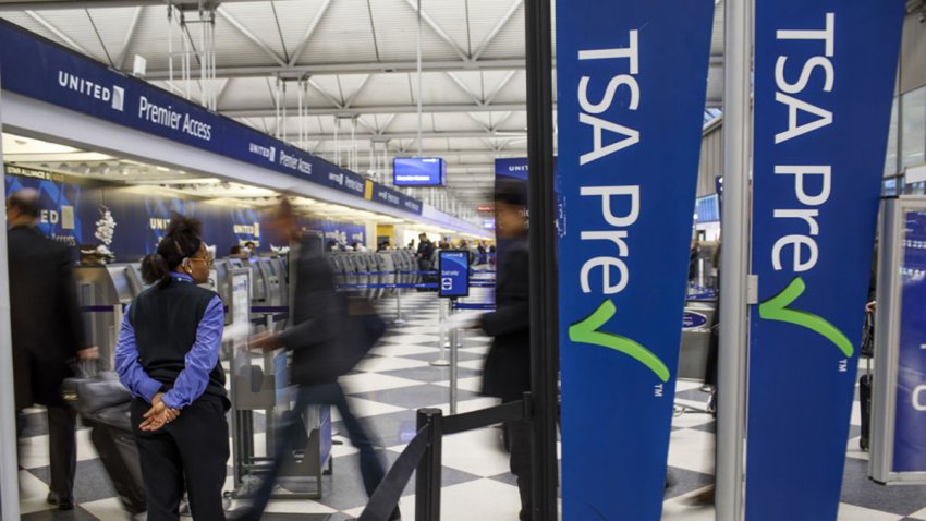 Passengers walk through the entrance of a TSA PreCheck in Terminal One at O’Hare International Airport on Feb. 1, 2017, in Chicago. (Armando L. Sanchez/Chicago Tribune/Tribune News Service via Getty Images)