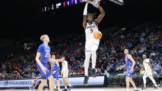 LAS VEGAS, NV – NOVEMBER 26: San Diego State Aztecs forward Pharaoh Compton (5) dunks the ball during a game against the Creighton Bluejays at the Players Era Festival on Tuesday, Nov. 26, 2024, at the MGM Grand Garden Arena in Las Vegas, Nevada. (Photo by Marc Sanchez/Icon Sportswire via Getty Images)