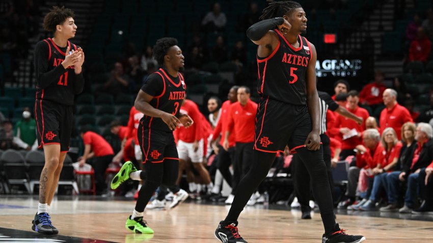 LAS VEGAS, NEVADA – NOVEMBER 30: Pharaoh Compton #5 of the San Diego State Aztecs reacts to a play at a timeout against the Houston Cougars in the first half of their game during the Players Era Festival basketball tournament at MGM Grand Garden Arena on November 30, 2024 in Las Vegas, Nevada. (Photo by Candice Ward/Getty Images)