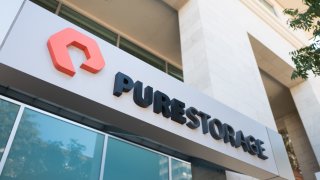 Low-angle view of sign with logo on facade of technology company Pure Storage in the Silicon Valley town of Mountain View, California, October 28, 2018. 