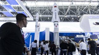 Models of the Long March rockets on display at the China National Space Administration (CNSA) booth during the China International Aviation & Aerospace Exhibition in Zhuhai, China, on Tuesday, Nov. 12, 2024. The event runs through Nov. 17. Photographer: Qilai Shen/Bloomberg via Getty Images