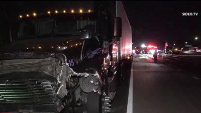 Oil spill after semi-truck crash closes lanes of I-805 near SR-52