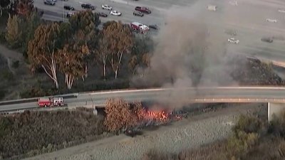 Brush fire sparks under SR-54 in National City