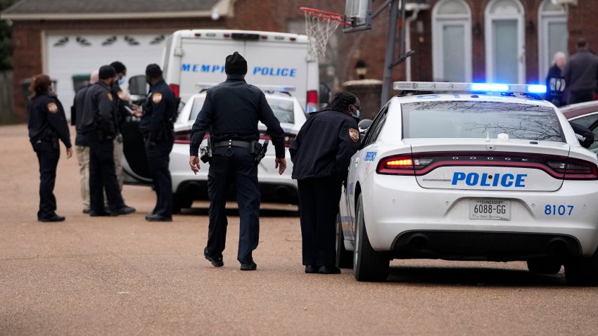 FILE – Members of the Memphis Police Department work a crime scene in Memphis, Tenn., Tuesday, Jan. 24, 2023.