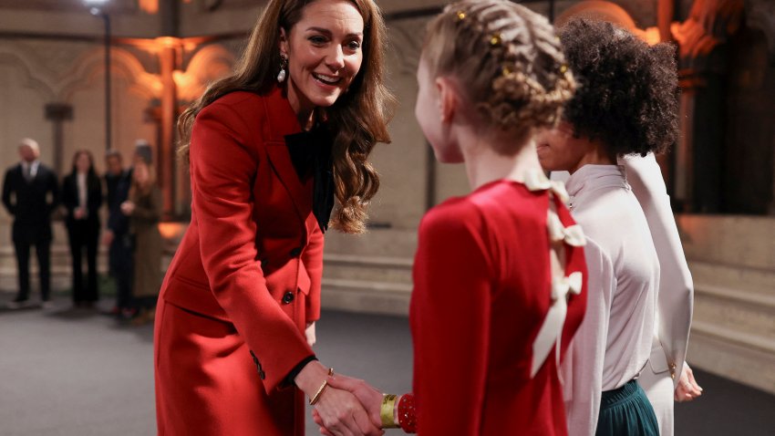 Britain’s Kate, Princess of Wales, greets children who are performing at the “Together At Christmas” carol service at Westminster Abbey in London, Britain, Dec. 6, 2024.