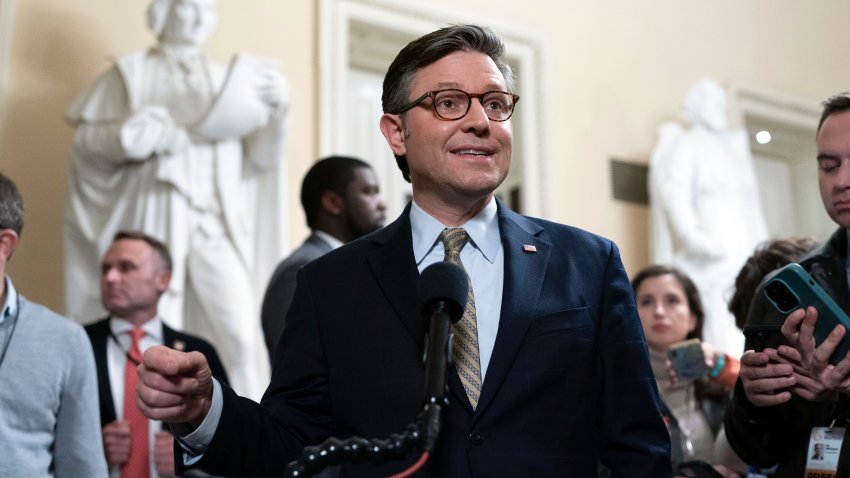 Speaker of the House Mike Johnson, R-La., talks to reporters after passing the funding bill to avert the government shutdown at the Capitol in Washington, Friday, Dec. 20, 2024.