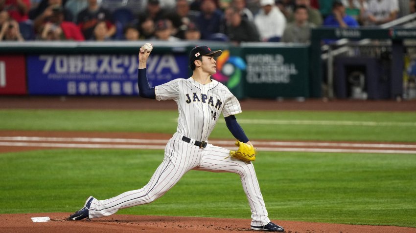 MIAMI, FL – MARCH 20: Roki Sasaki #14 of Japan delivers a pitch in the first inning against Mexico at loanDepot park on March 20, 2023 in Miami, Florida. (Photo by Jasen Vinlove/Miami Marlins/Getty Images)