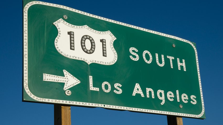 US 101 South Freeway sign points toward Los Angeles on a sunny day.